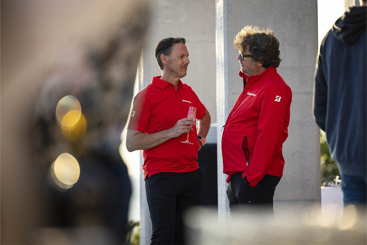 Nico Thuy in conversation with a colleague during the evening reception at the T33 launch