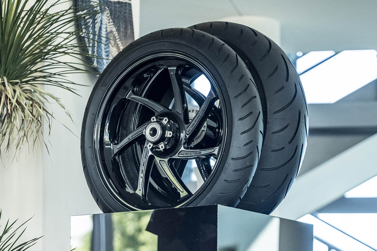 Bridgestone Battlax Sport Touring T33 front and rear tyres on display