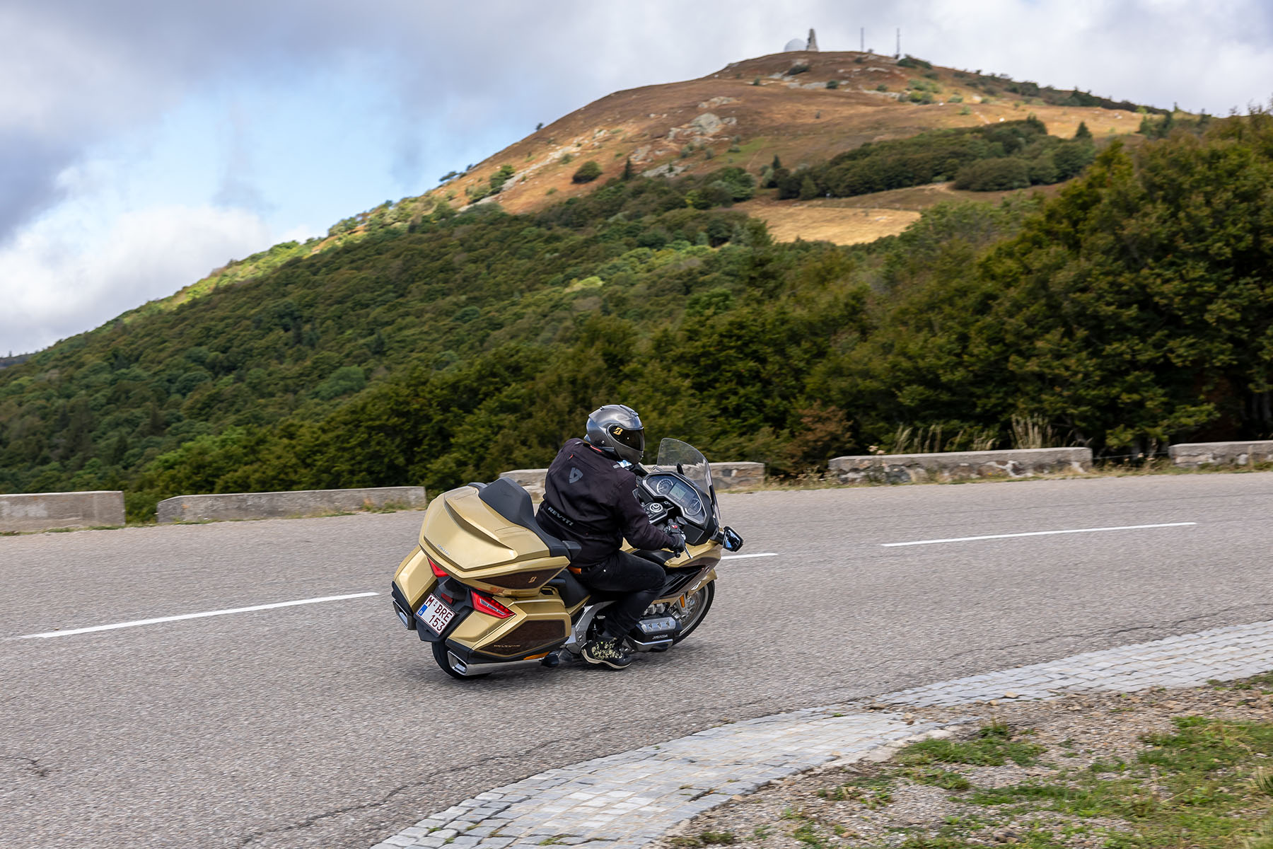 Honda GoldWing riding varied mountain road surfaces in the Vosges
