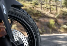 Bridgestone Launches BATTLAX ADVENTURE A42 Motorcycle Tyre Close-up of the Battlax Adventure A42 sidewall lettering on the front tyre of an adventure motorcycle