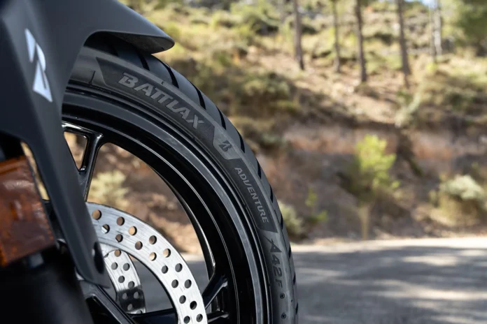 Close-up of the Battlax Adventure A42 sidewall lettering on the front tyre of an adventure motorcycle